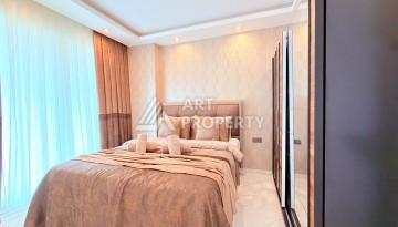 Стильная современная квартира 2+1 в новом комплексе в районе Каргыджак с видами на горы - Ракурс 13