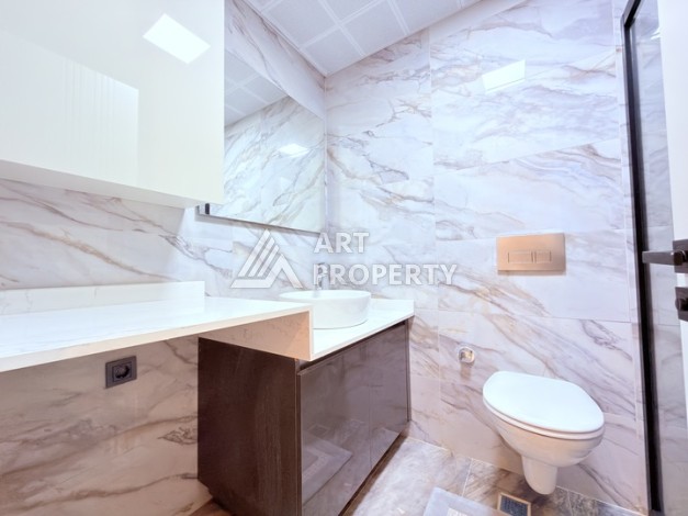 Стильная современная квартира 2+1 в новом комплексе в районе Каргыджак с видами на горы - Ракурс 14