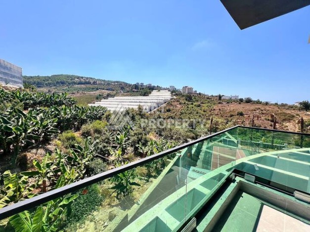 Стильная современная квартира 2+1 в новом комплексе в районе Каргыджак с видами на горы - Ракурс 18