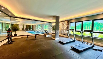 Стильная современная квартира 2+1 в новом комплексе в районе Каргыджак с видами на горы - Ракурс 21