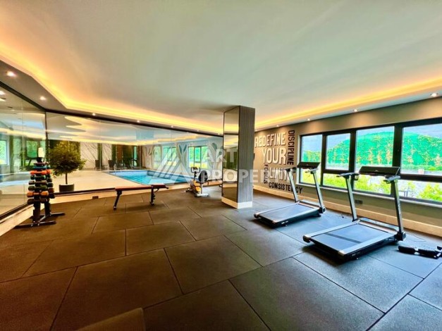 Стильная современная квартира 2+1 в новом комплексе в районе Каргыджак с видами на горы - Ракурс 20