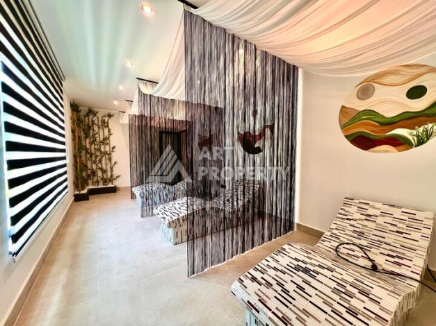 Стильная современная квартира 2+1 в новом комплексе в районе Каргыджак с видами на горы - Ракурс 31