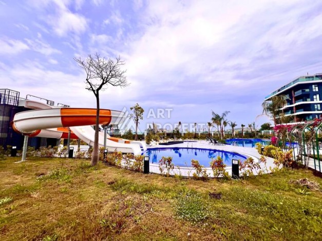 Стильная современная квартира 2+1 в новом комплексе в районе Каргыджак с видами на горы - Ракурс 36