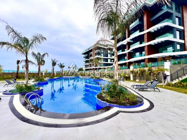 Стильная современная квартира 2+1 в новом комплексе в районе Каргыджак с видами на горы - Ракурс 41