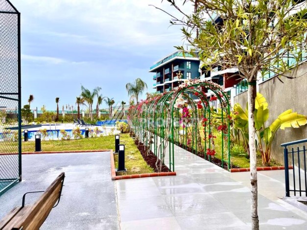 Стильная современная квартира 2+1 в новом комплексе в районе Каргыджак с видами на горы - Ракурс 44