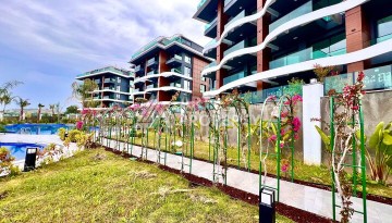 Стильная современная квартира 2+1 в новом комплексе в районе Каргыджак с видами на горы - Ракурс 46