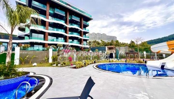 Стильная современная квартира 2+1 в новом комплексе в районе Каргыджак с видами на горы - Ракурс 49