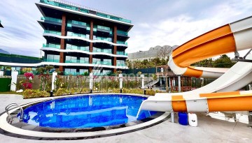 Стильная современная квартира 2+1 в новом комплексе в районе Каргыджак с видами на горы - Ракурс 50