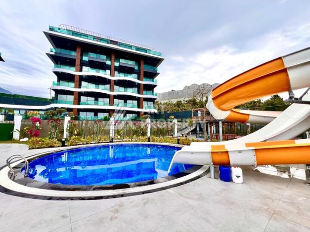 Стильная современная квартира 2+1 в новом комплексе в районе Каргыджак с видами на горы - Ракурс 49