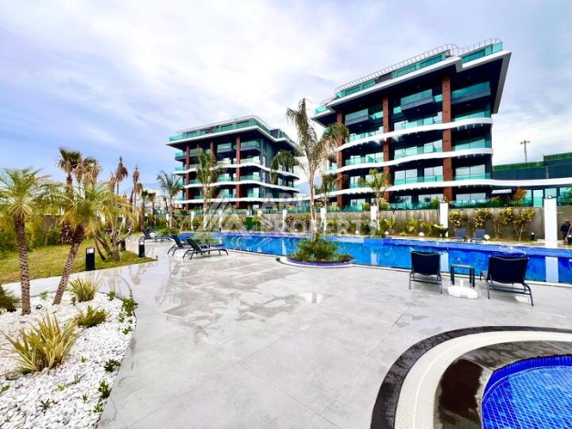 Стильная современная квартира 2+1 в новом комплексе в районе Каргыджак с видами на горы - Ракурс 50