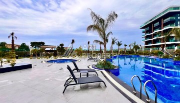 Стильная современная квартира 2+1 в новом комплексе в районе Каргыджак с видами на горы - Ракурс 54