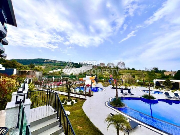 Стильная современная квартира 2+1 в новом комплексе в районе Каргыджак с видами на горы - Ракурс 55