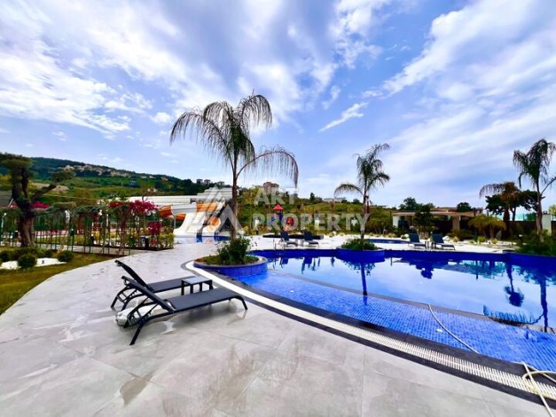 Стильная современная квартира 2+1 в новом комплексе в районе Каргыджак с видами на горы - Ракурс 57