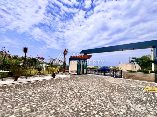 Стильная современная квартира 2+1 в новом комплексе в районе Каргыджак с видами на горы - Ракурс 59