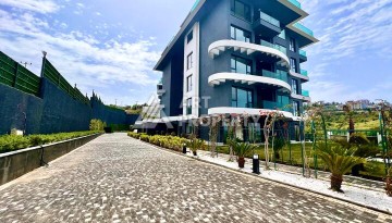 Стильная современная квартира 2+1 в новом комплексе в районе Каргыджак с видами на горы - Ракурс 62