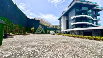 Стильная современная квартира 2+1 в новом комплексе в районе Каргыджак с видами на горы - Ракурс 68