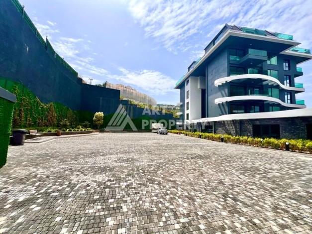 Стильная современная квартира 2+1 в новом комплексе в районе Каргыджак с видами на горы - Ракурс 67