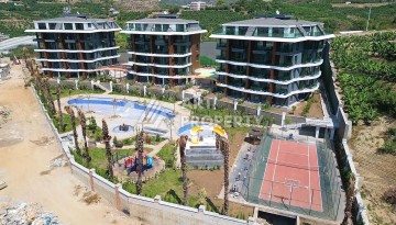 Стильная современная квартира 2+1 в новом комплексе в районе Каргыджак с видами на горы - Ракурс 71