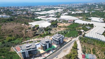 Стильная современная квартира 2+1 в новом комплексе в районе Каргыджак с видами на горы - Ракурс 74