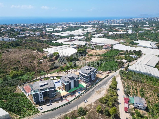 Стильная современная квартира 2+1 в новом комплексе в районе Каргыджак с видами на горы - Ракурс 73