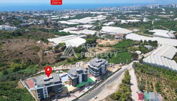 Стильная современная квартира 2+1 в новом комплексе в районе Каргыджак с видами на горы - Ракурс 75