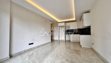 Квартира 2+1 в новом комплексе у моря в районе Махмутлар, улица Барбароса - Ракурс 2