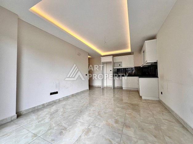 Квартира 2+1 в новом комплексе у моря в районе Махмутлар, улица Барбароса - Ракурс 1