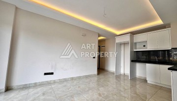 Квартира 2+1 в новом комплексе у моря в районе Махмутлар, улица Барбароса - Ракурс 3