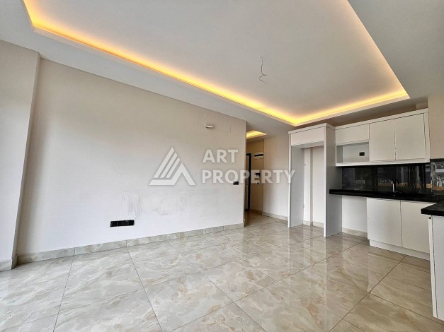 Квартира 2+1 в новом комплексе у моря в районе Махмутлар, улица Барбароса - Ракурс 2