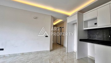 Квартира 2+1 в новом комплексе у моря в районе Махмутлар, улица Барбароса - Ракурс 4