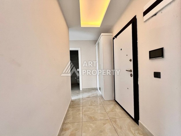 Квартира 2+1 в новом комплексе у моря в районе Махмутлар, улица Барбароса - Ракурс 4