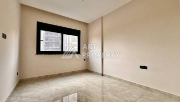 Квартира 2+1 в новом комплексе у моря в районе Махмутлар, улица Барбароса - Ракурс 9