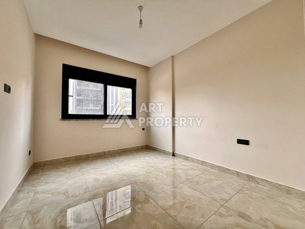 Квартира 2+1 в новом комплексе у моря в районе Махмутлар, улица Барбароса - Ракурс 8