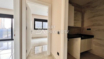 Квартира 2+1 в новом комплексе у моря в районе Махмутлар, улица Барбароса - Ракурс 11