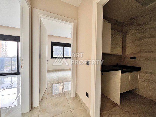 Квартира 2+1 в новом комплексе у моря в районе Махмутлар, улица Барбароса - Ракурс 10