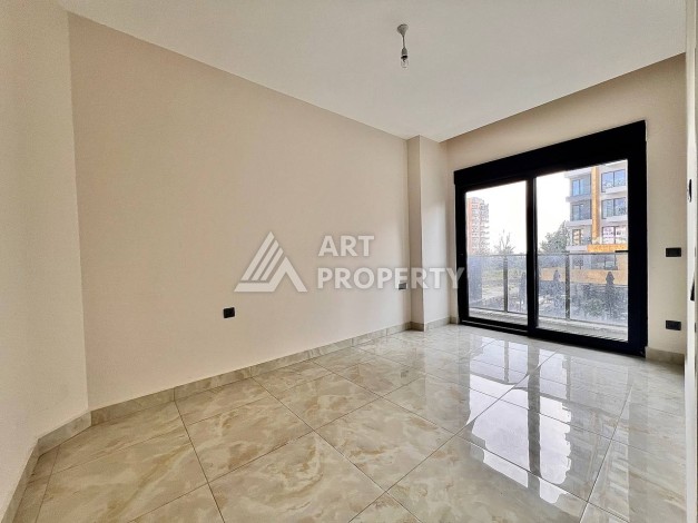 Квартира 2+1 в новом комплексе у моря в районе Махмутлар, улица Барбароса - Ракурс 11