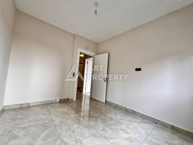 Квартира 2+1 в новом комплексе у моря в районе Махмутлар, улица Барбароса - Ракурс 12