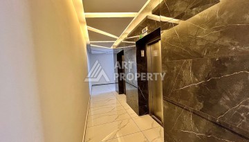 Квартира 2+1 в новом комплексе у моря в районе Махмутлар, улица Барбароса - Ракурс 14