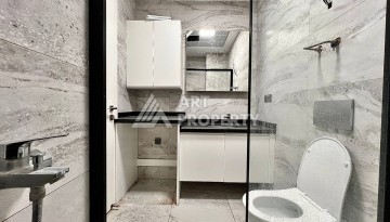 Квартира 2+1 в новом комплексе у моря в районе Махмутлар, улица Барбароса - Ракурс 16