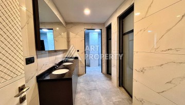 Квартира 2+1 в новом комплексе у моря в районе Махмутлар, улица Барбароса - Ракурс 19