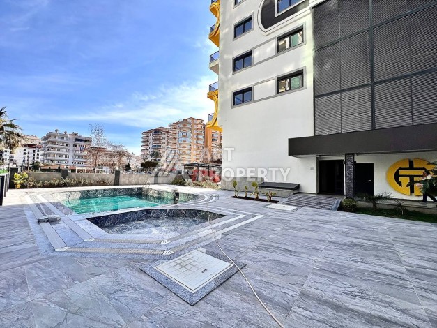 Квартира 2+1 в новом комплексе у моря в районе Махмутлар, улица Барбароса - Ракурс 26