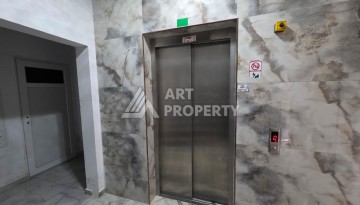 Квартира 1+1 в Махмутларе, 55 кв.м. - Ракурс 2