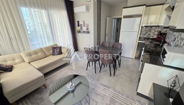 Квартира 1+1 в Махмутларе, 55 кв.м. - Ракурс 6