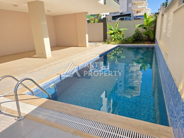 Квартира 1+1 в Махмутларе, 55 кв.м. - Ракурс 10