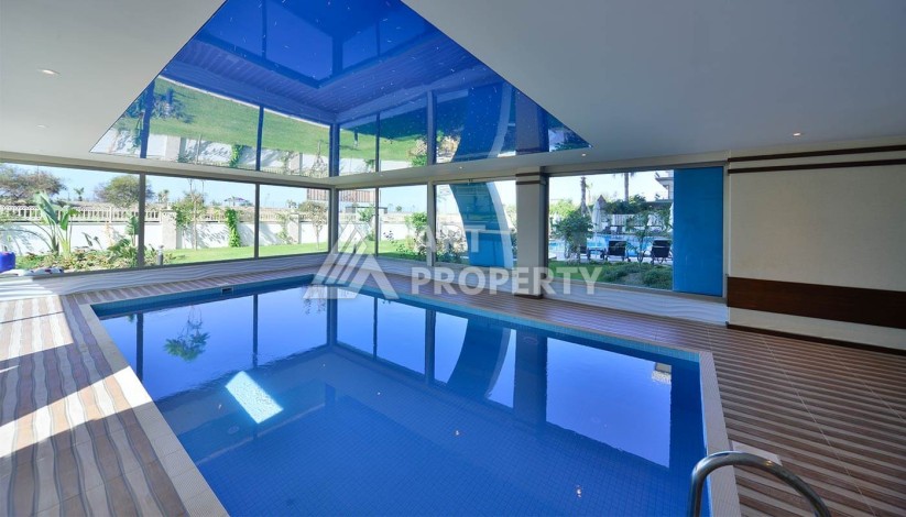 Квартира на первой береговой линии с прямым видом на море в Махмутларе - Ракурс 25