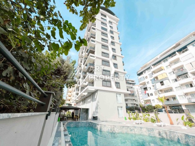 Светлая квартира 1+1 в районе Махмутлар, 50 кв.м. - Ракурс 0