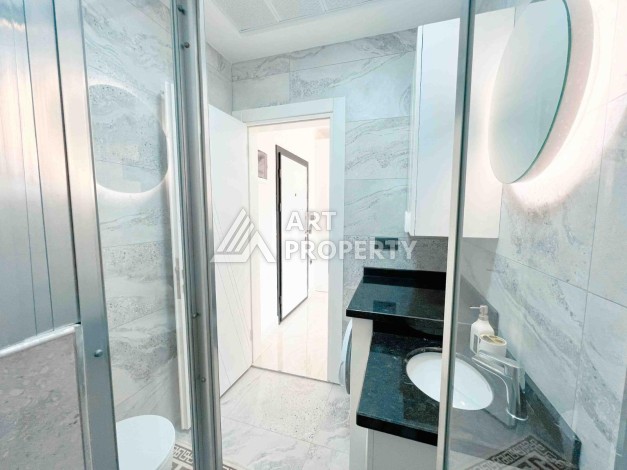 Светлая квартира 1+1 в районе Махмутлар, 50 кв.м. - Ракурс 1