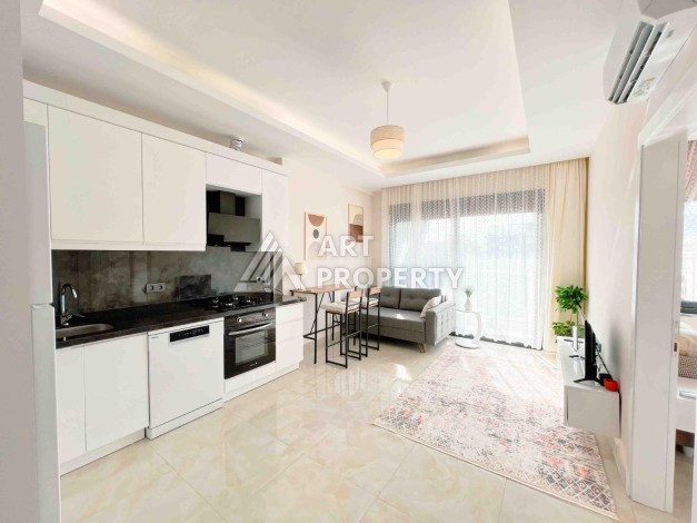 Светлая квартира 1+1 в районе Махмутлар, 50 кв.м. - Ракурс 2