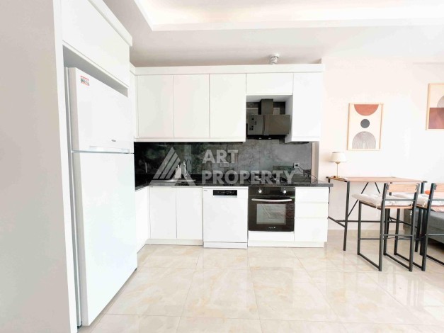 Светлая квартира 1+1 в районе Махмутлар, 50 кв.м. - Ракурс 7