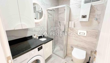 Светлая квартира 1+1 в районе Махмутлар, 50 кв.м. - Ракурс 9